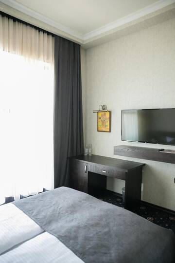 Фото номера Стандартный двухместный номер с 1 кроватью Отель Amberd Hotel г. Бюракан 5