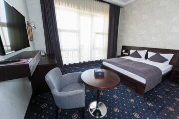 Фото номера Двухместный номер Делюкс с 1 кроватью и видом на Арарат Отель Amberd Hotel г. Бюракан 3