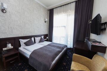 Фото номера Стандартный двухместный номер с 1 кроватью Отель Amberd Hotel г. Бюракан 8